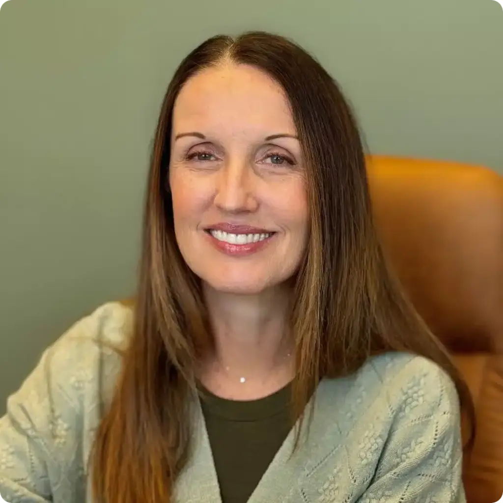 Shawn, Scheduling Coordinator, smiling warmly in a professional portrait at Beaverton Orthodontics in Beaverton, OR